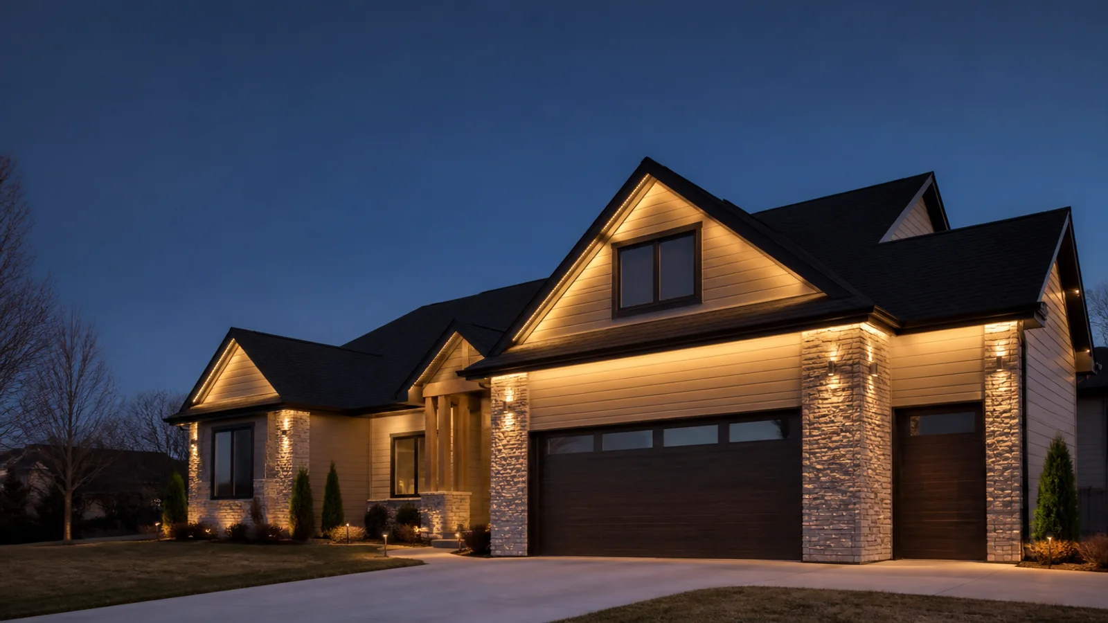 Warm accent lighting on stone and siding